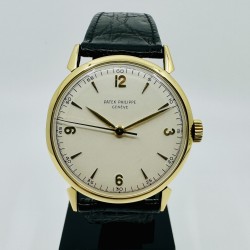 Patek Philippe Calatrava or vintage Spider lugs